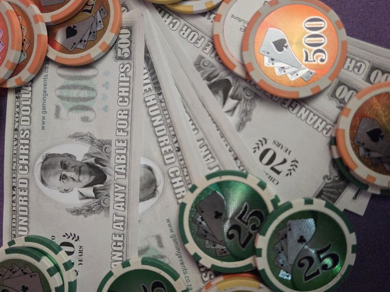 Fun money notes and casino chips used instead of real cash at a fun casino event